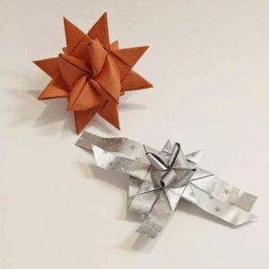 Folding paper stars with Vivian